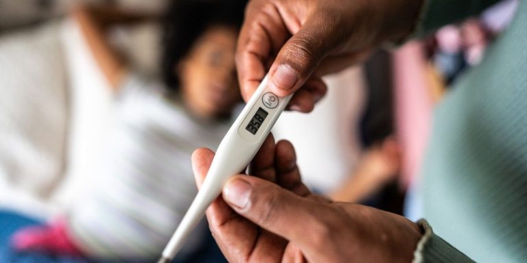 a-close-up-of-someone-reading-a-thermometer.jpg